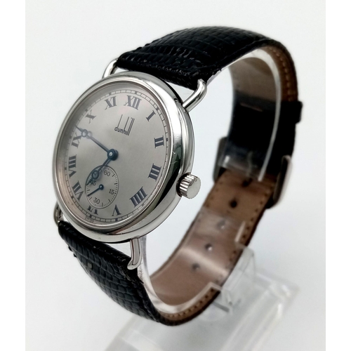 569 - A very elegant DUNHILL gents watch. 33 mm case , all streel construction with Swiss mechanical movem... 