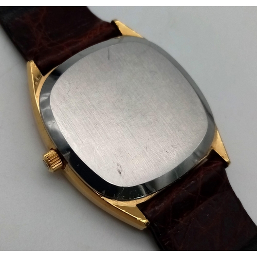 582 - An OMEGA DEVILLE 18 K yellow gold plated, gents, watch. Case diameter: 34 mm, gold tone bezel, face,... 