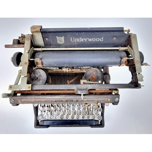 688 - Two Rare Antique Machines - An Underwood Typewriter and a W.J.H. and Co sewing machine. As found.