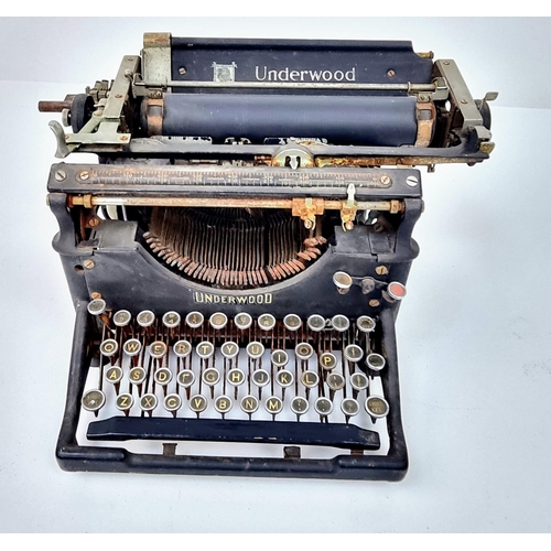 688 - Two Rare Antique Machines - An Underwood Typewriter and a W.J.H. and Co sewing machine. As found.