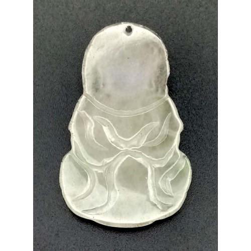 759 - A jade, hand carved pendant of Buddha. Height: 45 mm, weight: 9.8 g.