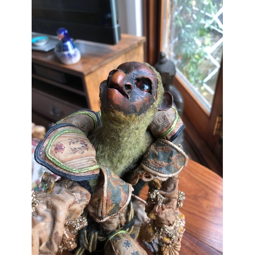 272 - A extremely rare 19th century and early antique papier-mâché siting monkey 
possibly from a automato... 