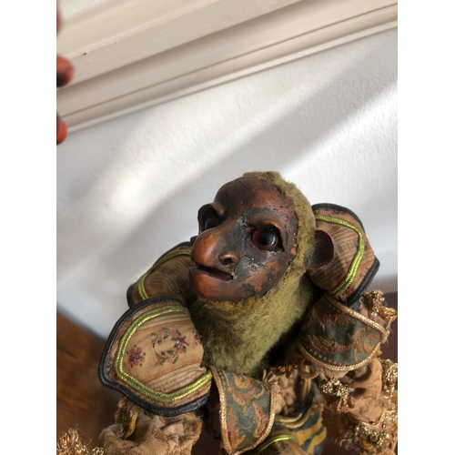 272 - A extremely rare 19th century and early antique papier-mâché siting monkey 
possibly from a automato... 