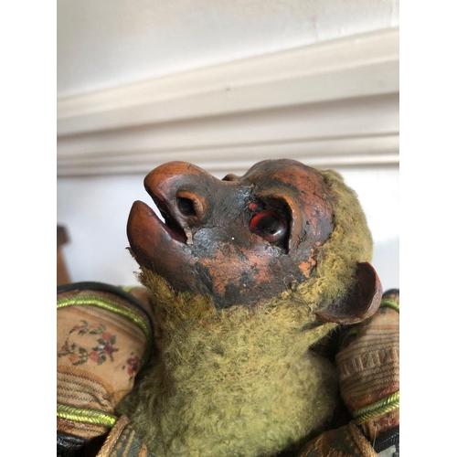 272 - A extremely rare 19th century and early antique papier-mâché siting monkey 
possibly from a automato... 