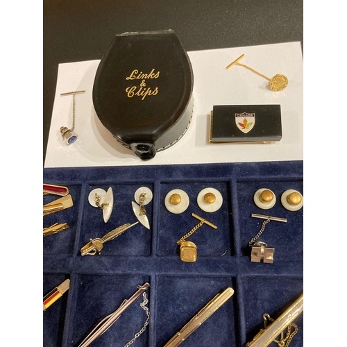 336 - Large selection of vintage tie clips,tie pins and shirt studs, together with Canadian money clip.Pre... 