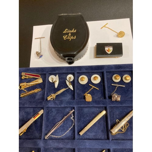 336 - Large selection of vintage tie clips,tie pins and shirt studs, together with Canadian money clip.Pre... 