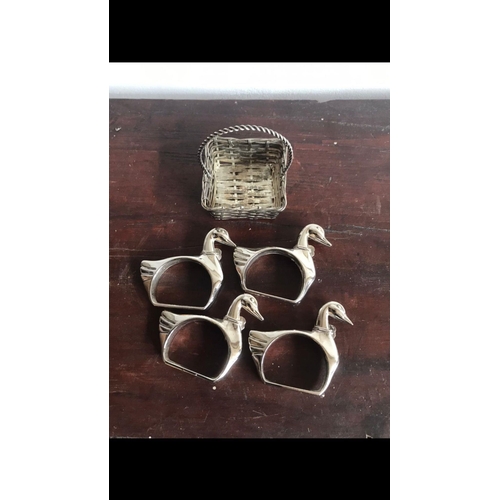 862 - Set of four silver plated Napkin rings in original fitted basket 
Each are 6 cm
Total weight include... 