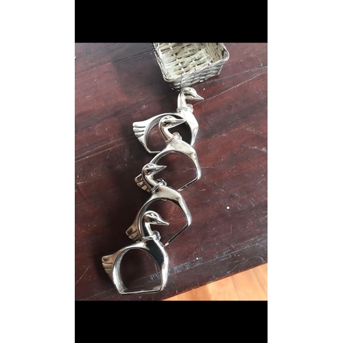 862 - Set of four silver plated Napkin rings in original fitted basket 
Each are 6 cm
Total weight include... 