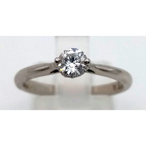 109 - A platinum solitaire diamond (0.25 carats) ring. Size: M, weight: 2.3 g.