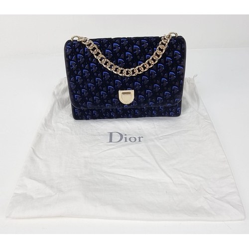 150 - A Christian Dior Diorama Flap Bag with Blue Oblique Velvet Exterior. Gilded hardware. Blue leather i... 