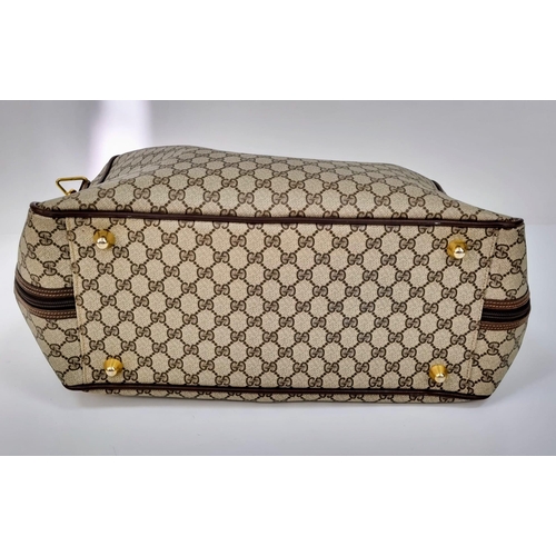 157 - A Gucci Ophidia Small Suitcase/Carry On. Gucci monogram canvas exterior. Red and green handles with ... 