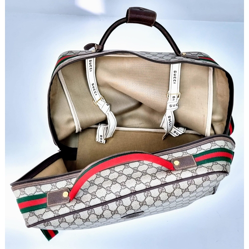 157 - A Gucci Ophidia Small Suitcase/Carry On. Gucci monogram canvas exterior. Red and green handles with ... 