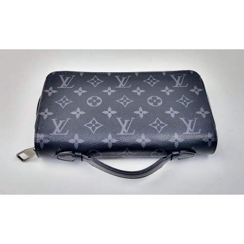 17 - A Louis Vuitton Zippy XL Gents Wallet. Monogram grey exterior. Large middle zipped compartment. Plen... 