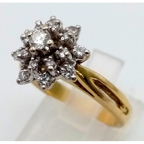 199 - An 18 K yellow gold ring with a cluster of diamonds (0.30 carats), size: N1/2, weight: 6.4 g.