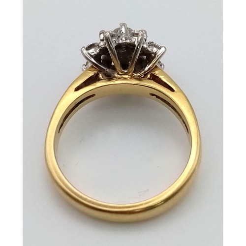 199 - An 18 K yellow gold ring with a cluster of diamonds (0.30 carats), size: N1/2, weight: 6.4 g.