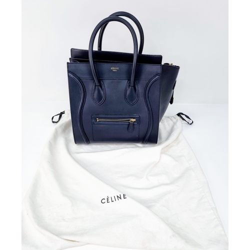 270 - A Celine of Paris Black Leather Small Tote Bag. Exterior pocket for convenience. Interior zipped and... 