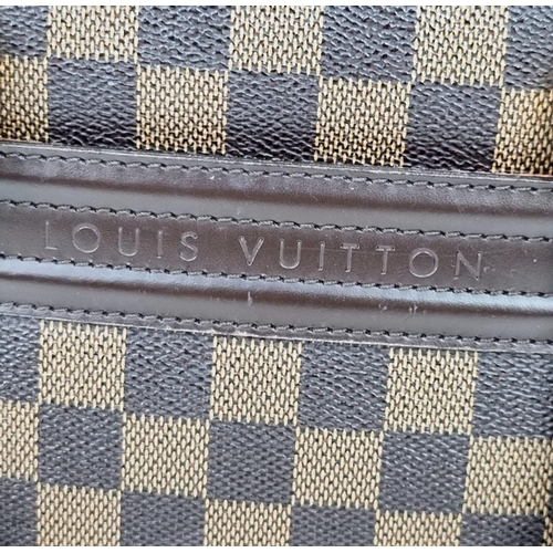 309 - A Louis Vuitton Classic Bowling Bag. Checked canvas exterior with gilded hardware. Cloth interior wi... 