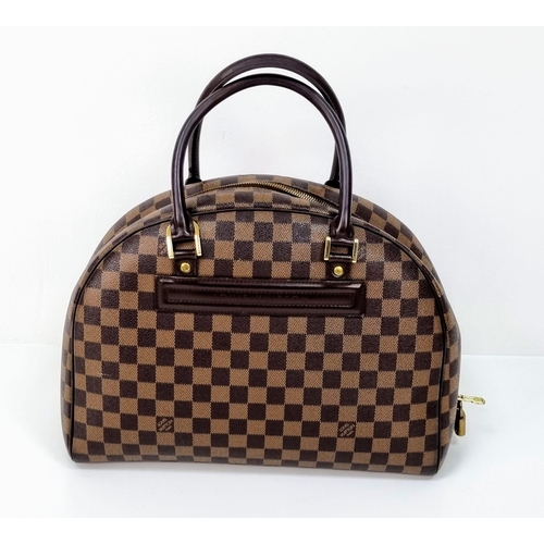 309 - A Louis Vuitton Classic Bowling Bag. Checked canvas exterior with gilded hardware. Cloth interior wi... 