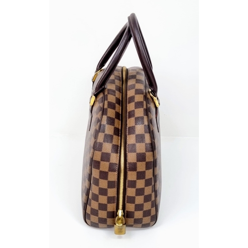 309 - A Louis Vuitton Classic Bowling Bag. Checked canvas exterior with gilded hardware. Cloth interior wi... 