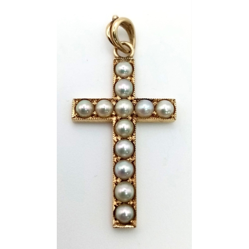 775 - A 9 K yellow gold cross pendant with real natural marine pearls. Height: 28 mm, weight: 2 g.