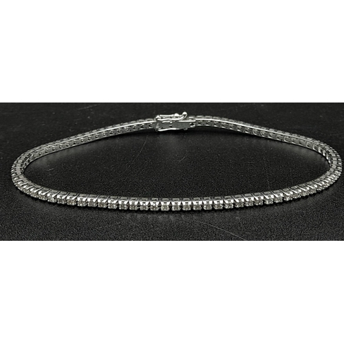 151 - A 18ct White Gold 1.5ct Diamond Line Tennis Bracelet. Simple and Stunning, Length 19cm