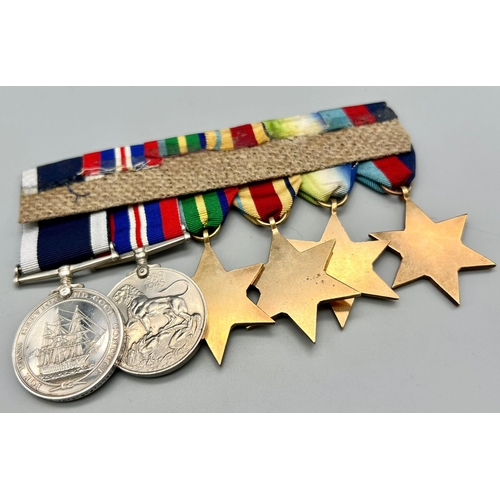 580 - A Royal Navy Long Service and Good Conduct Medal (Geo VI second type, fixed suspender) and WW2 campa... 