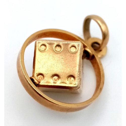 1035 - A 9 K yellow gold dice charm/pendant. Weight: 2.5 g.