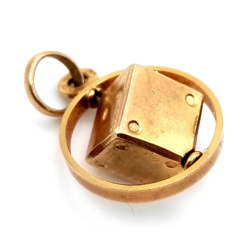 1035 - A 9 K yellow gold dice charm/pendant. Weight: 2.5 g.