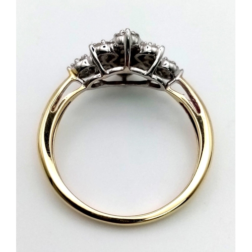 640 - A 9 K yellow gold ring with a cluster of diamonds set on white gold. Total 0.40 carats of diamonds. ... 