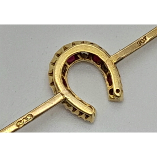 122 - An Antique Victorian 9K Yellow Gold, Ruby and Diamond Lucky Horse-shoe Bar Brooch. Six quality diamo... 