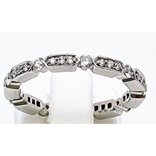 165 - 18k White Gold Ring Set with 36 Round Cut Diamonds, 0.56ct total diamonds, Ring Size M. Total Weight... 