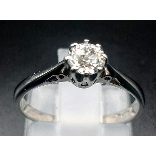 241 - An 18 K white gold solitaire diamond (0.25 carats) ring. Size: J, weight: 2.1 g.