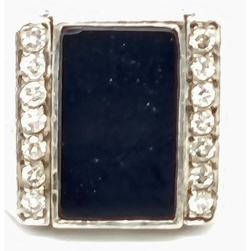 249 - An 18k White Gold Gents Black Onyx and Diamond Swivel Signet Ring. Size P. 25.11g total weight. Ref:... 