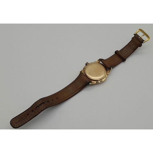 277 - A Vintage 9K Gold Rotary Mechanical Gents Watch. Original leather strap. Gold case - 36mm. Two tone ... 