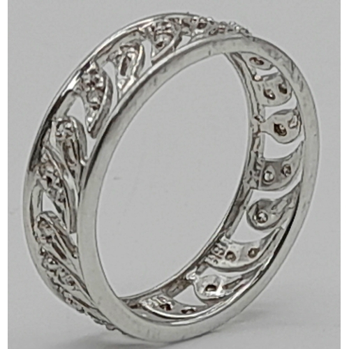 346 - An 18 K white gold ring with a fancy openwork of diamond bands. Ring size: O, weight: 3 g.