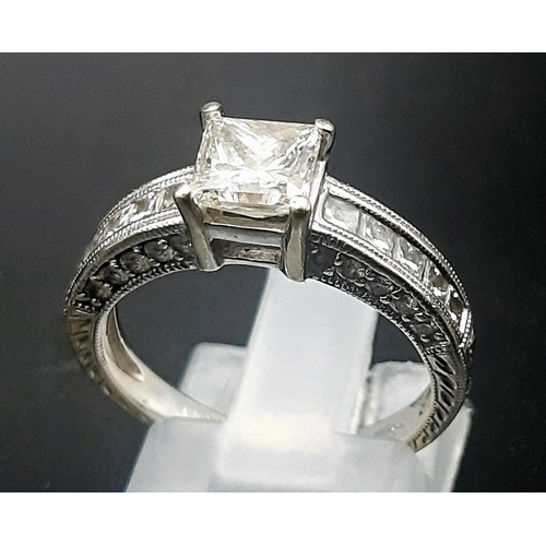 38 - A 14K White Gold Princess Cut Diamond Ring. High-grade princess cut diamond with diamond shoulders. ... 