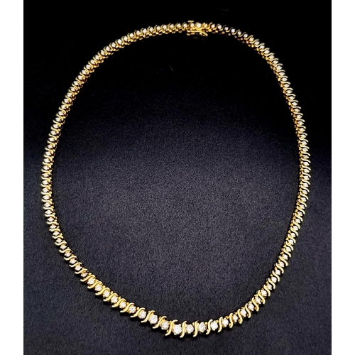 60 - A 14K Yellow Gold Diamond Tennis Necklace. 115 brilliant round cut diamonds - 3.6ct. 40cm. 34.51g to... 