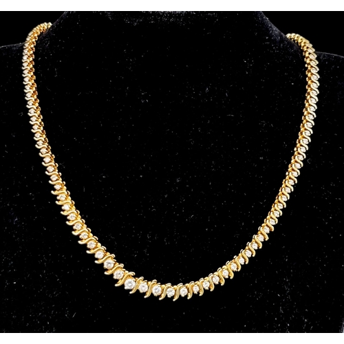 60 - A 14K Yellow Gold Diamond Tennis Necklace. 115 brilliant round cut diamonds - 3.6ct. 40cm. 34.51g to... 