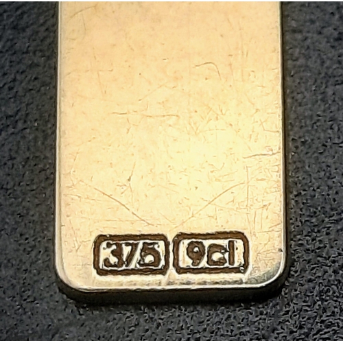 921 - A 9 K yellow gold ID plate pendant.  Length: 30 mm, weight: 1.5 g.