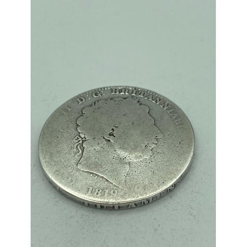 637 - GEORGE 111 SILVER CROWN 1819. Condition worn to both sides ,words around edge remain raised and clea... 