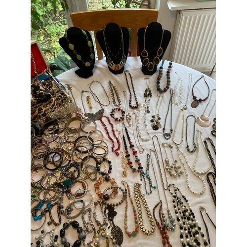 750 - AN ENORMOUS COLLECTION of QUALITY JEWELLERY, together with a colossal selection of BRACELETS and BAN... 