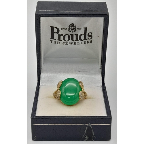 247 - A Superb Imperial Jade Large Cabochon 9K Gold Ring with Diamond Surrounds. Size P. 6.62g total weigh... 