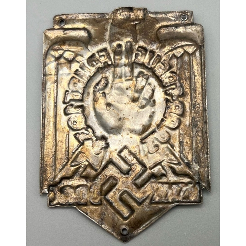 69 - A German Third Reich N.S.K.K. Metal Rally Plaque. 6 x 8.5cm.