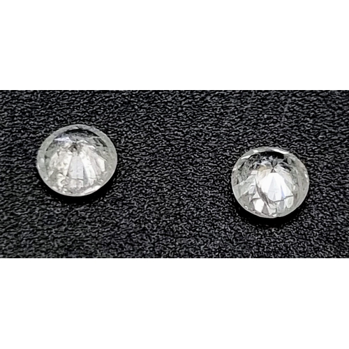 702 - PAIR OF ROUND BRILIANT CUT DIAMONDS, TOTAL WEIGHT 0.38CT