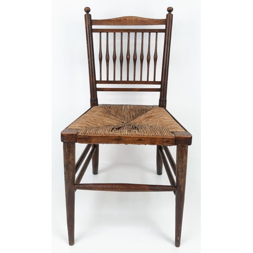 1244 - A Childs Antique Oak and Rush Seat Ladder-Back Chair.
67cm tall.