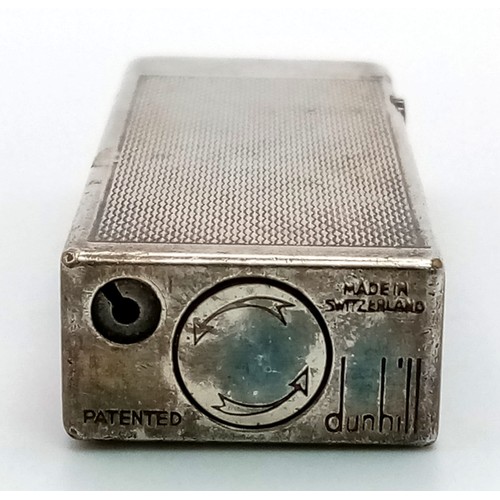 555 - A Vintage Silver Tone Dunhill Lighter. A/f