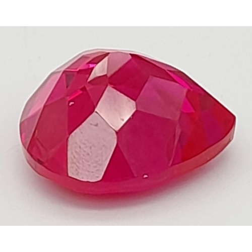 112 - A high quality, large (55 carats), pear cut, ruby. Excellent colour saturation and uniform distribut... 