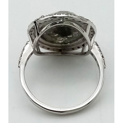 14 - A 6.25ct Salt and Pepper Diamond 14k White Gold Ring - with a halo of 0.47ct Diamond Accents. Size M... 