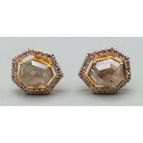 37 - A 2.30ct Pair of Yellow Diamond Stud Earrings in 14k Gold -with .40ct Diamond Accents. 3.1g total we... 