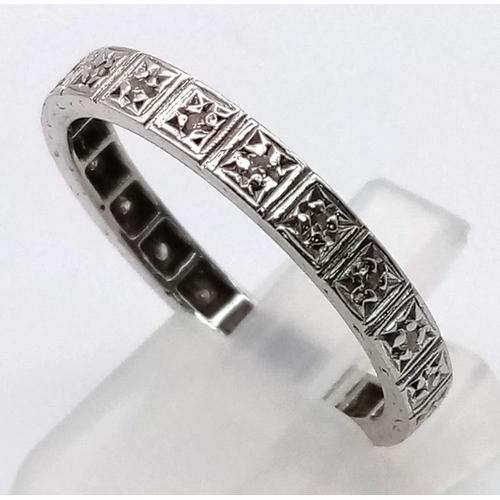 866 - AN 18K WHITE GOLD DIAMOND ETERNITY RING.  4.3gms  size V